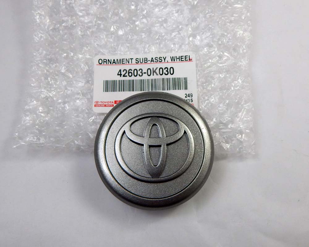 Genuine Toyota wheel center cap OEM 42603-0K030 for 2004–2012 Toyota Hilux