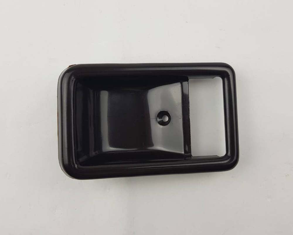 Brown inner door handle bezel detail 1 for Toyota Corolla / Sprinter KE70 / AE70 / AE71 / TE72