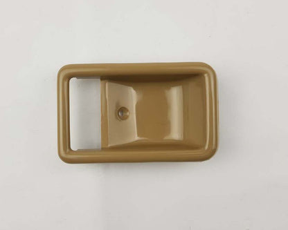 Beige inner door handle bezel detail 1 for Toyota Corolla KE70 / KE71 / TE72 / TE73