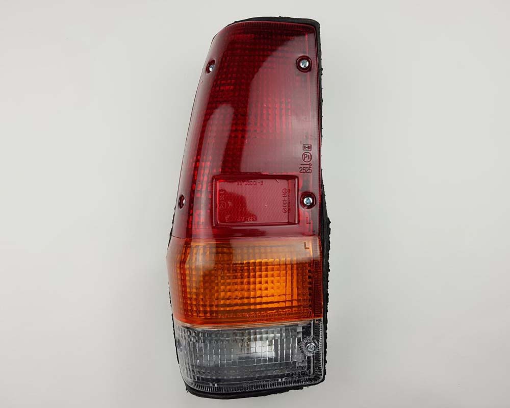 Rear Combination Tail Light - for Mitsubishi L200 / Dodge D50 Ram 50 1983–1986 - Left LH - OEM MB185533