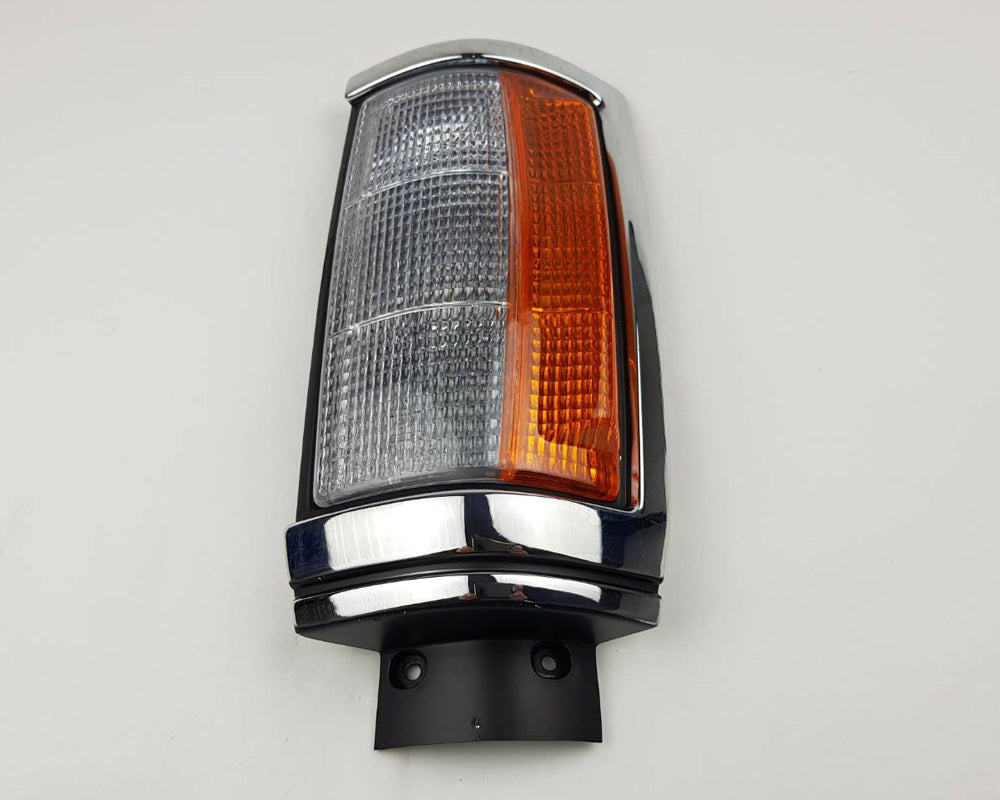 Front Corner Turn Signal Light - for Mitsubishi L200 Cyclone Aerobody 1979–1987 - Black/Chrome - Left LH - OEM MB527787