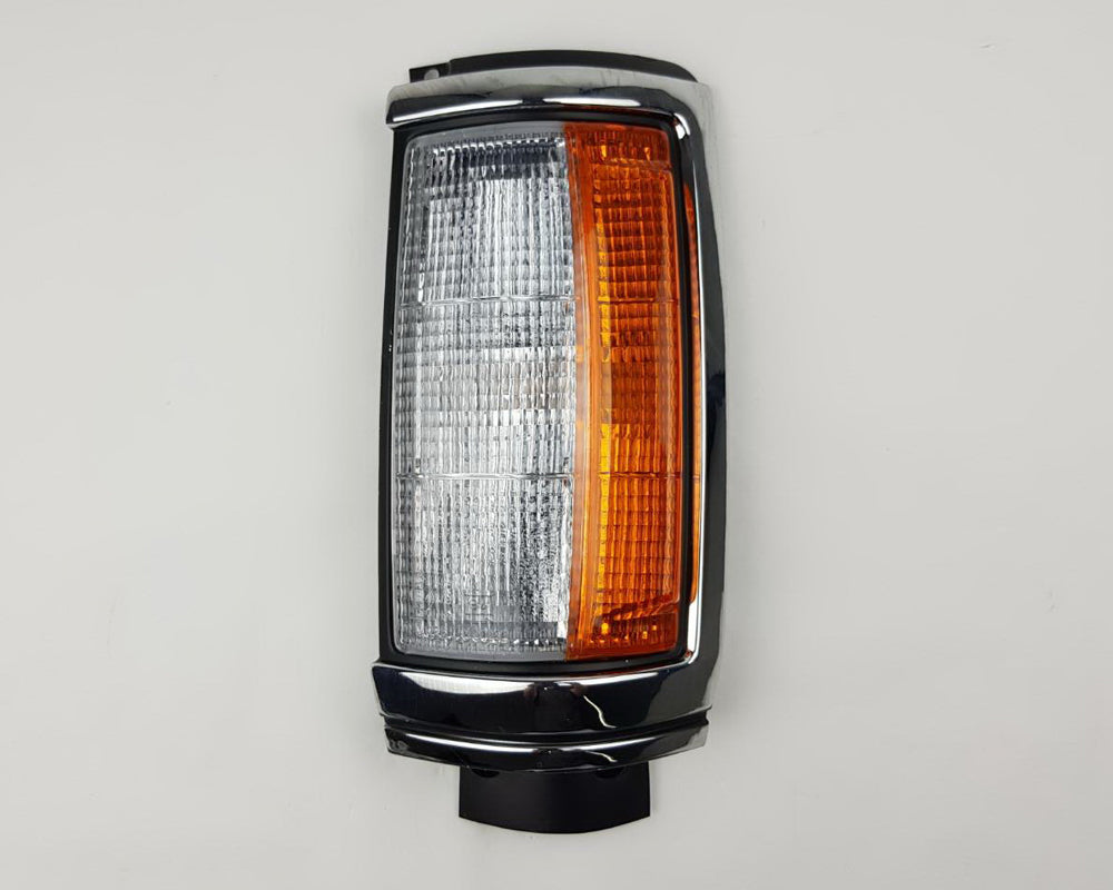 Front Corner Turn Signal Light - for Mitsubishi L200 Cyclone Aerobody 1979–1987 - Black/Chrome - Left LH - OEM MB527787