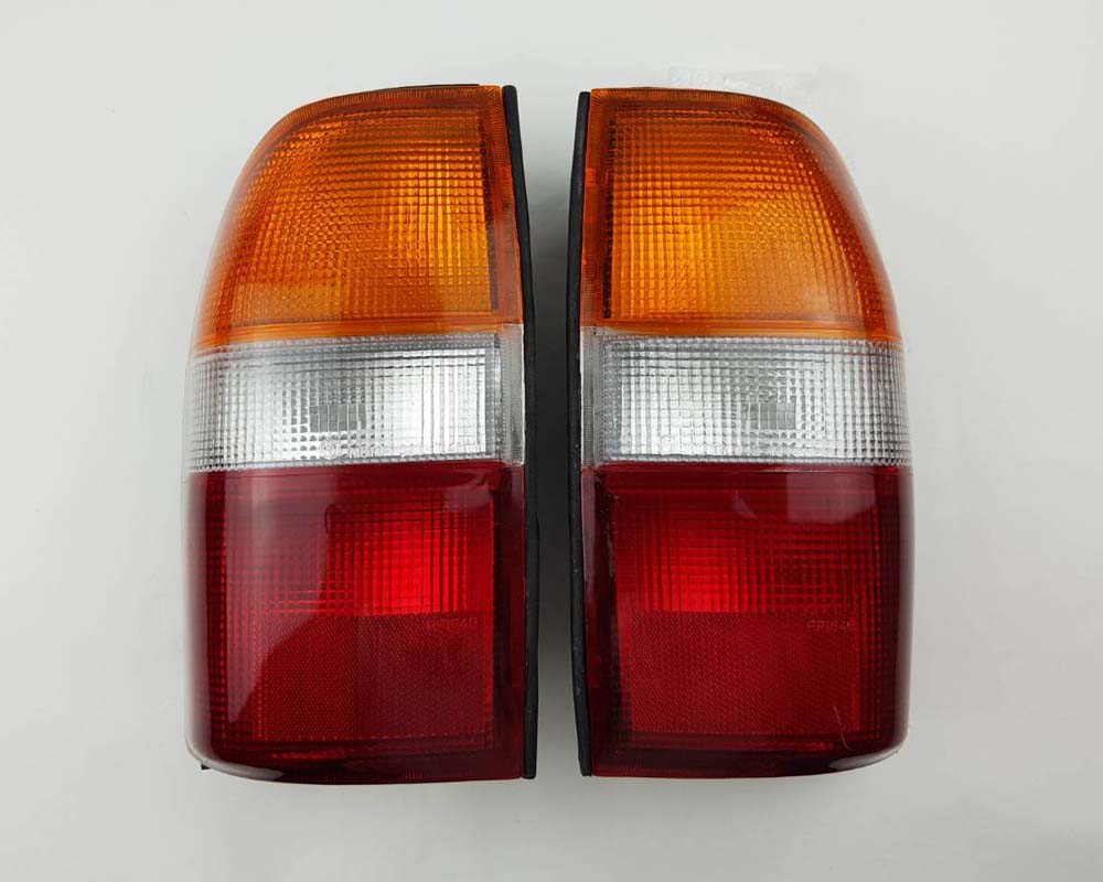 Rear Combination Tail Light Pair for Mitsubishi L200 Strada - Amber / Clear / Red - LH + RH