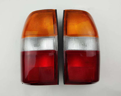Rear Combination Tail Light Pair for Mitsubishi L200 Strada - Amber / Clear / Red - LH + RH