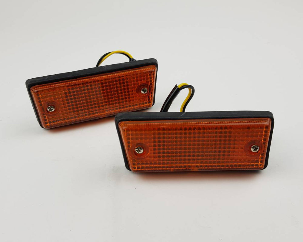 Mitsubishi L200 front bumper turn signal light LH and RH pair
