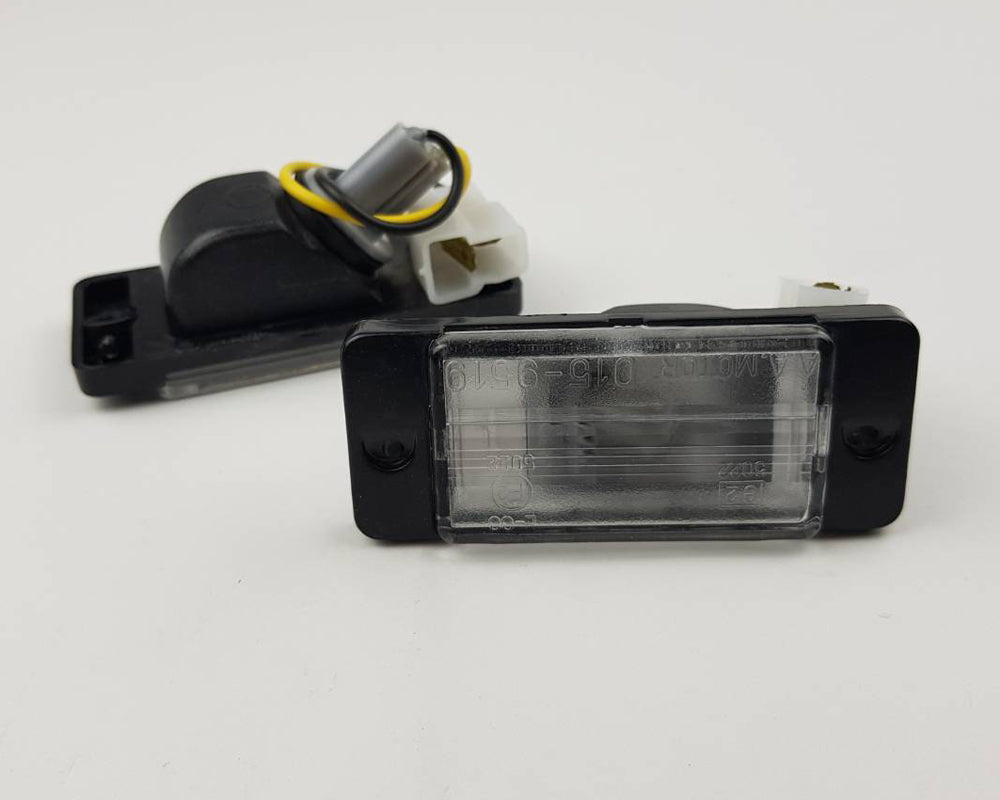 Mitsubishi L200 Strada license plate light pair rear view