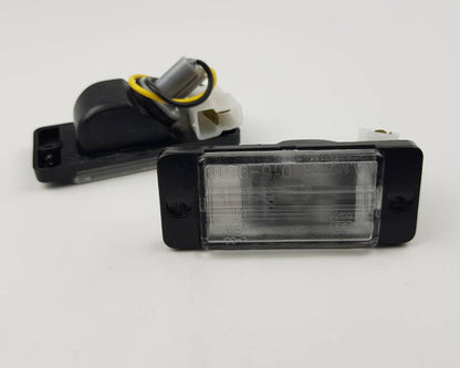 Mitsubishi L200 Strada license plate light pair rear view