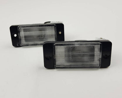 Mitsubishi L200 Strada license plate light pair