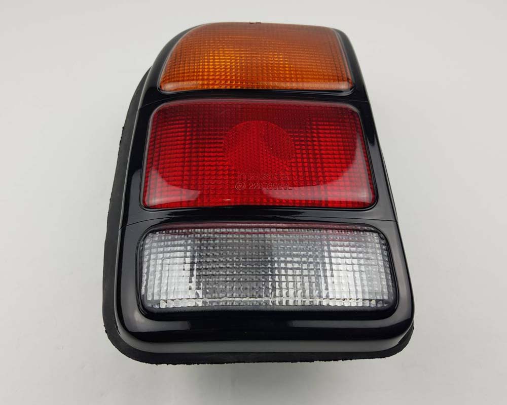 Rear Combination Tail Light for Mazda B1400 Pickup - CAB - Black - Amber / Red / Clear - LH / Left - view 3