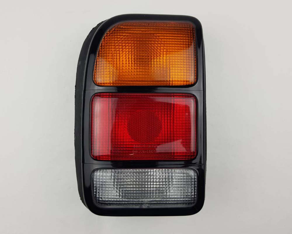 Rear Combination Tail Light for Mazda B1400 Pickup - CAB - Black - Amber / Red / Clear - LH / Left