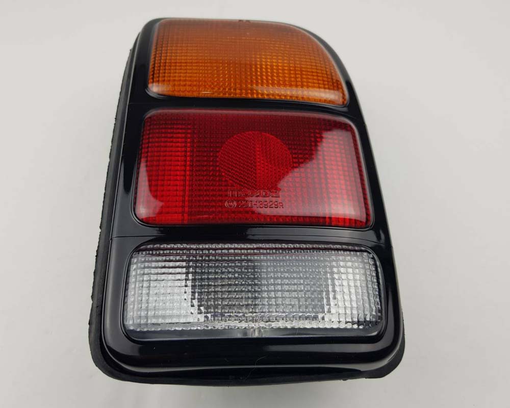 Rear Combination Tail Light for Mazda B1400 Pickup - CAB - Black - Amber / Red / Clear - RH / Right - view 3