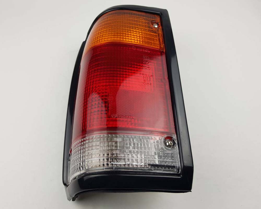 Rear Combination Tail Light for Mazda B2200 Pickup - Black - Amber / Red / Clear - LH / Left - view 3