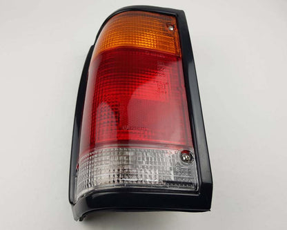 Rear Combination Tail Light for Mazda B2200 Pickup - Black - Amber / Red / Clear - LH / Left - view 3