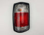 Mazda Magnum Rear Combination Tail Light – Red / Clear – Black Frame – LH / Left