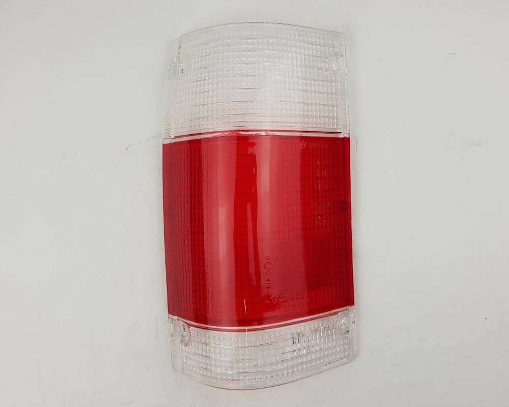 Mazda Magnum Rear Combination Tail Light Lens – Red / Clear – LH / Left