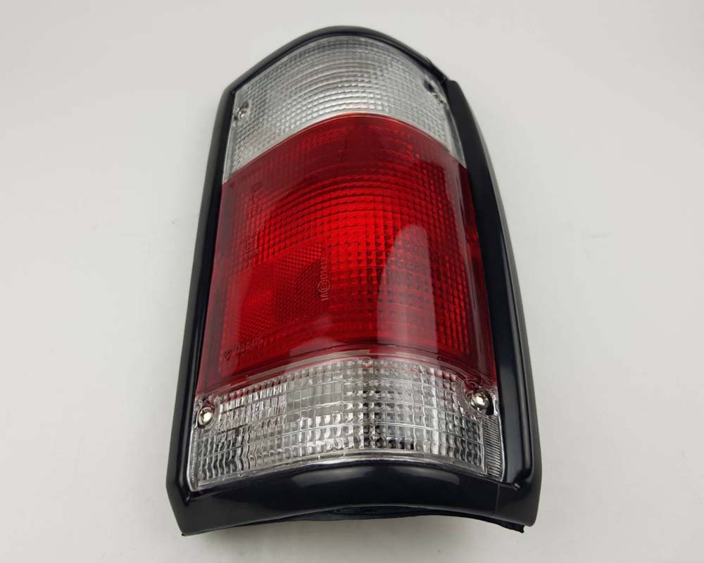 Mazda Magnum Rear Combination Tail Light – Red / Clear – Black Frame – RH / Right – view 3
