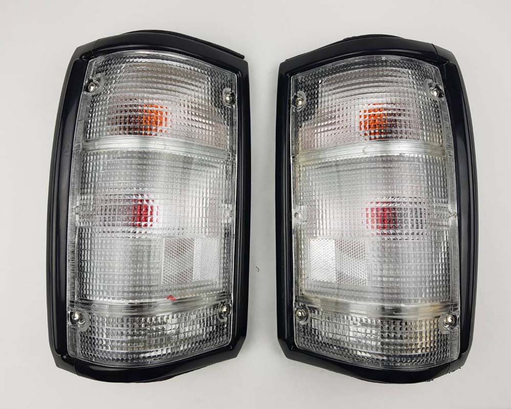 Mazda Magnum Rear Combination Tail Light – Full Clear – Black Frame – LH + RH Pair
