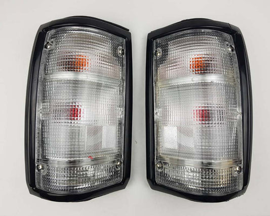 Mazda Magnum Rear Combination Tail Light – Full Clear – Black Frame – LH + RH Pair