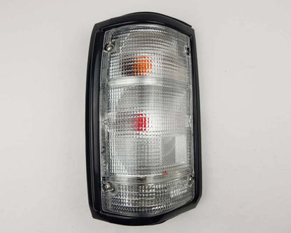 Mazda Magnum Rear Combination Tail Light – Full Clear – Black Frame – LH / Left