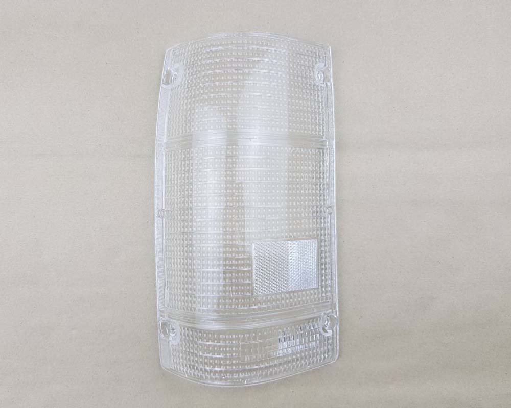 Mazda Magnum Rear Combination Tail Light Lens – Full Clear – LH / Left