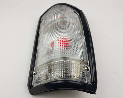 Mazda Magnum Rear Combination Tail Light – Full Clear – Black Frame – RH / Right – view 3