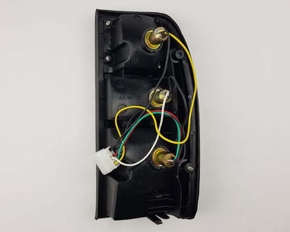 Mazda B2500 Fighter Rear Combination Tail Light – Full Clear – Black Frame – LH / Left – view 2