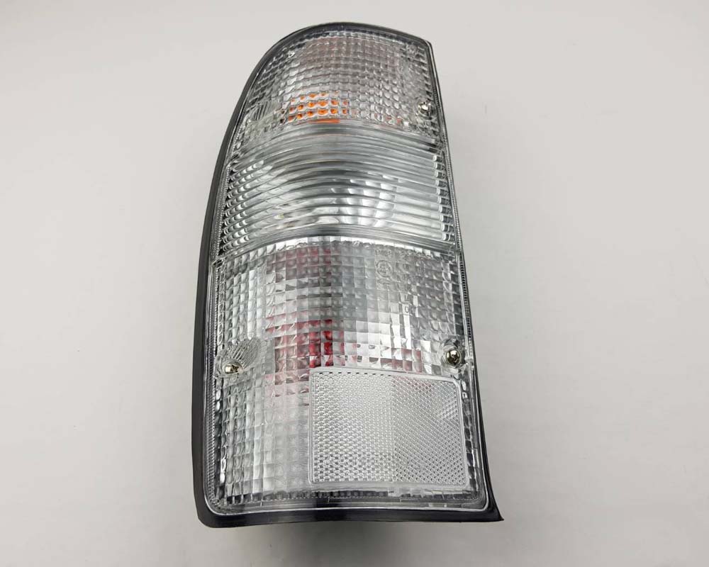 Mazda B2500 Fighter Rear Combination Tail Light – Full Clear – Black Frame – LH / Left – view 3