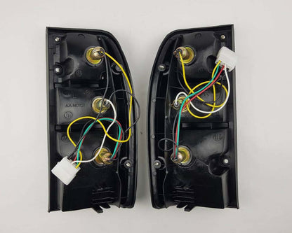 Mazda B2500 Fighter Rear Combination Tail Light – Full Clear – Black Frame – LH + RH Pair – view 2