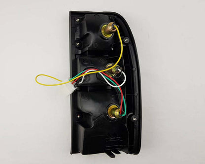 Mazda B2500 Fighter Rear Combination Tail Light – Red / Clear – Black Frame – LH / Left – view 2