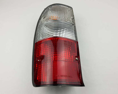 Mazda B2500 Fighter Rear Combination Tail Light – Red / Clear – Black Frame – LH / Left – view 3