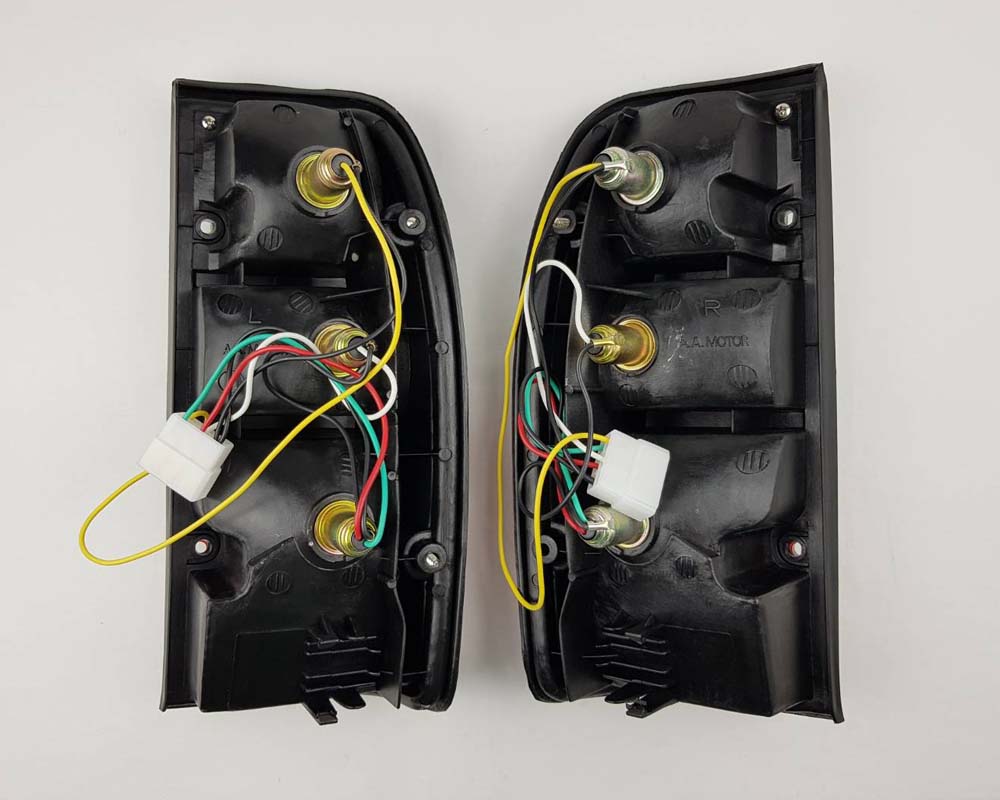 Mazda B2500 Fighter Rear Combination Tail Light – Red / Clear – Black Frame – LH + RH Pair – view 2
