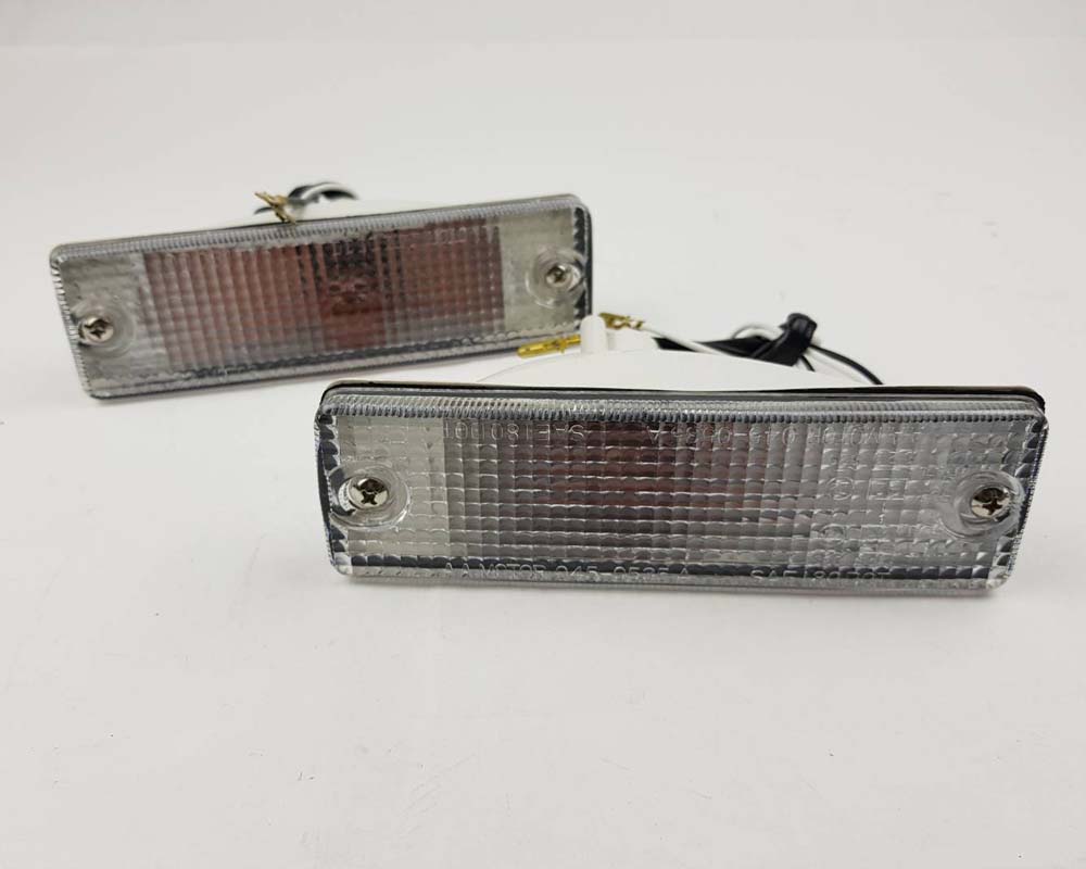 Mazda Magnum / 323 Front Bumper Turn Signal Light – Clear – Pair – Pair