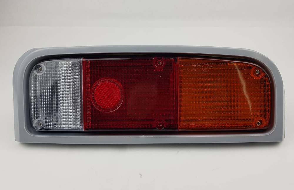 Left Hand (LH) rear combination tail light for 1975–1978 Toyota Hilux RN20 / RN25 Pickup OEM 81560-89803