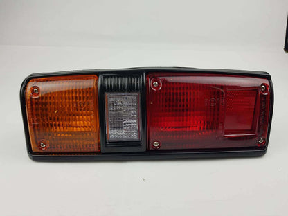 Right Hand (RH) rear combination tail light for 1979–1984 Toyota Hilux RN30 / RN40 Pickup OEM 81550-39505