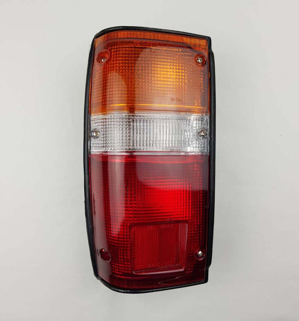 Left Hand (LH) rear combination tail light for 1984–1988 Toyota Hilux LN50-series Pickup OEM 81560-39785