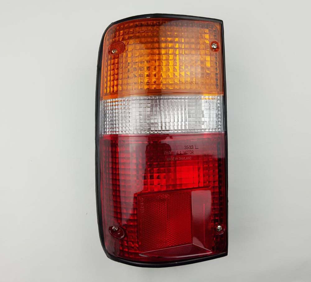Left Hand (LH) rear combination tail light for 1987–1999 Toyota Hilux / Mighty-X LN85 Pickup OEM 81560-89163
