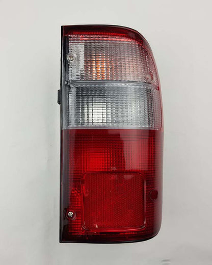 Front bumper turn signal light pair LH RH for 1979–1981 Toyota Hilux RN30 / RN40 Pickup OEM 81520-39315 81510-39315