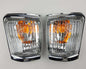Front bumper turn signal light pair LH RH for 1979–1981 Toyota Hilux RN30 / RN40 Pickup OEM 81520-39315 81510-39315