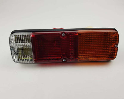 Front bumper turn signal light pair LH RH for 1979–1981 Toyota Hilux RN30 / RN40 Pickup OEM 81520-39315 81510-39315