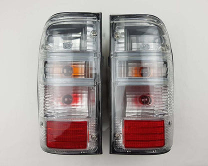 Front bumper turn signal light pair LH RH for 1979–1981 Toyota Hilux RN30 / RN40 Pickup OEM 81520-39315 81510-39315